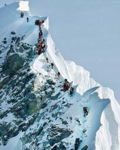 Climbers Navigate Iconic Hillary Step in Final Push Toward the Summit of Everest
