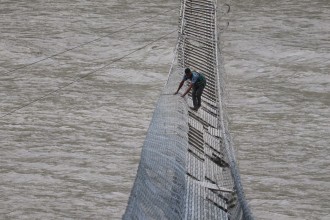 Flood-Damaged Trishuli Suspension Bridge Under Repair as Access Routes Are Restored